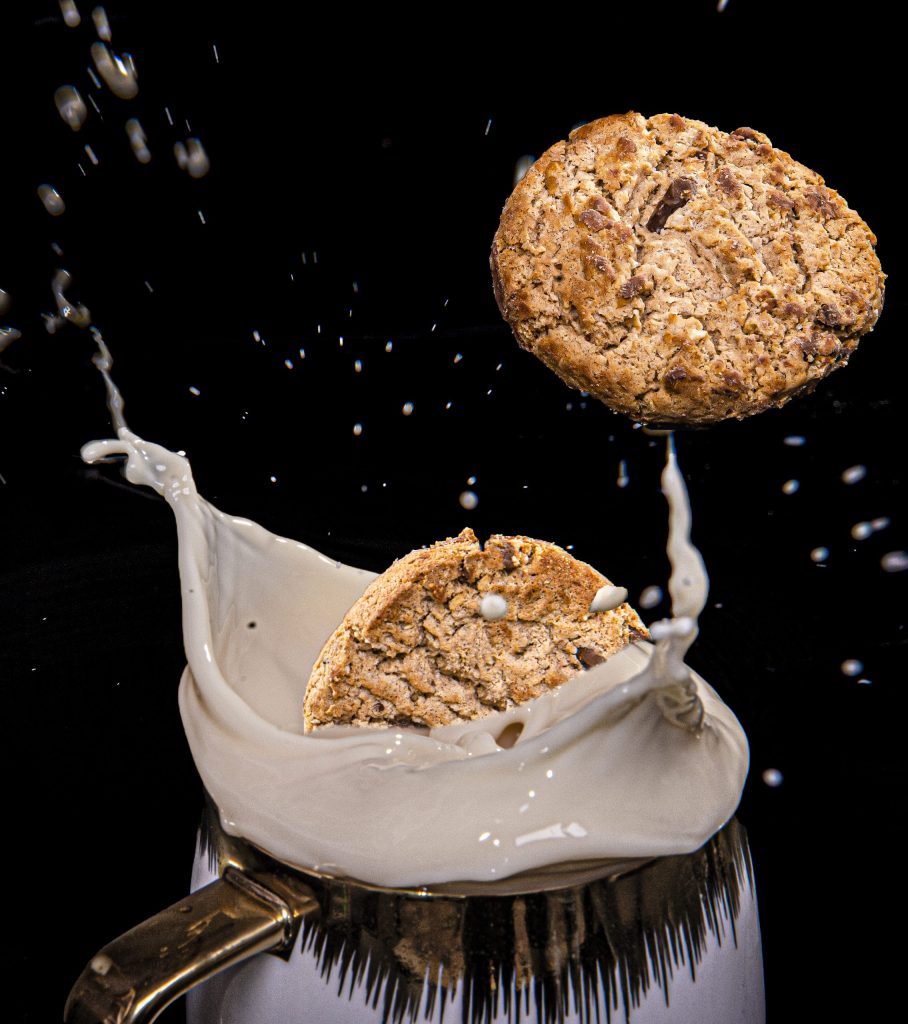 Cookies formed a splash when dropped in a cup of milk