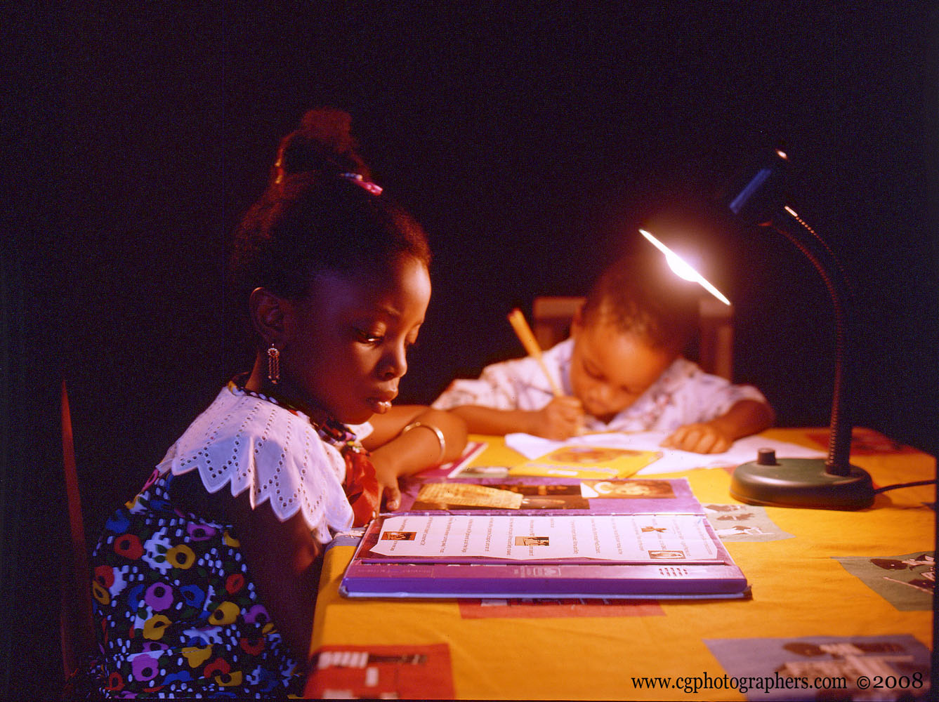 Advertising photography of children studying at the dining table