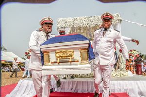 Burial Event photography - men carrying a coffin