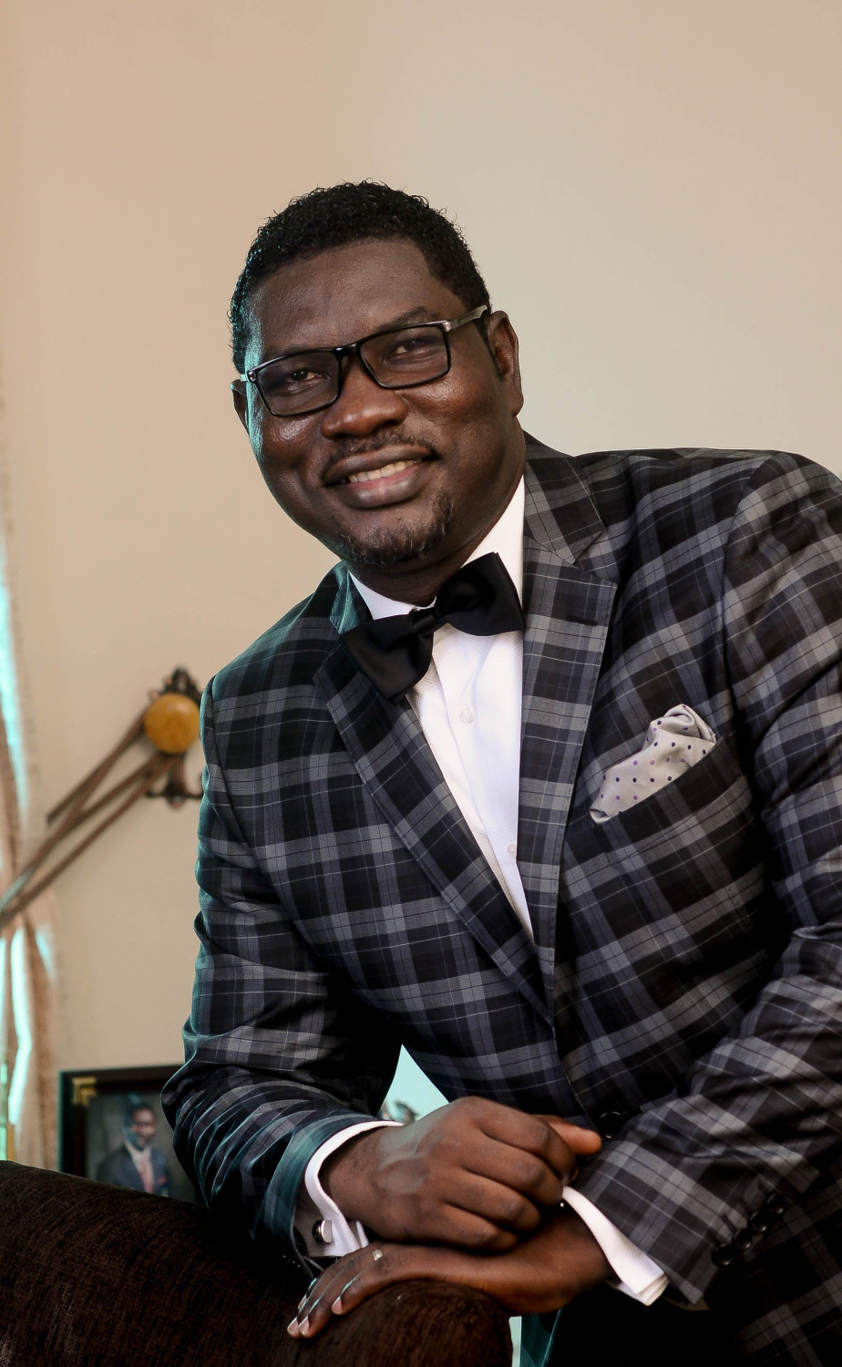 Portrait photography of a smiling man in suite