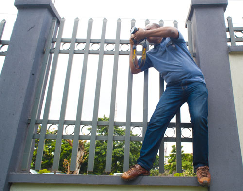 Emma Ologeh in action shooting. A portrait, wedding, event photographer in Lagos - Nigeria