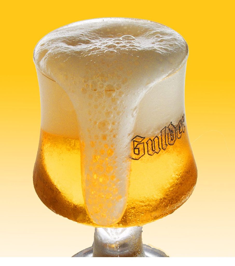 Beverage product advertising photography of a beer glass with foam in Lagos Nigeria