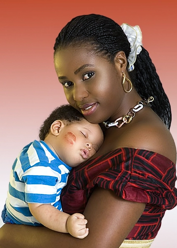 Family lifestyle advertising photography of a mother holding her baby in Lagos Nigeria