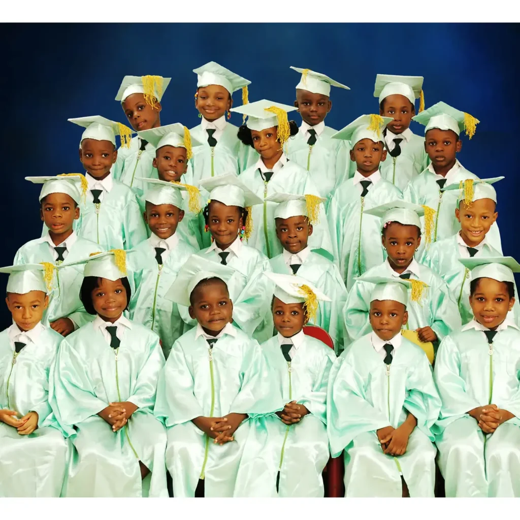 Nursery school graduation group photo of children wearing cap and gown studio photography Lagos Nigeria