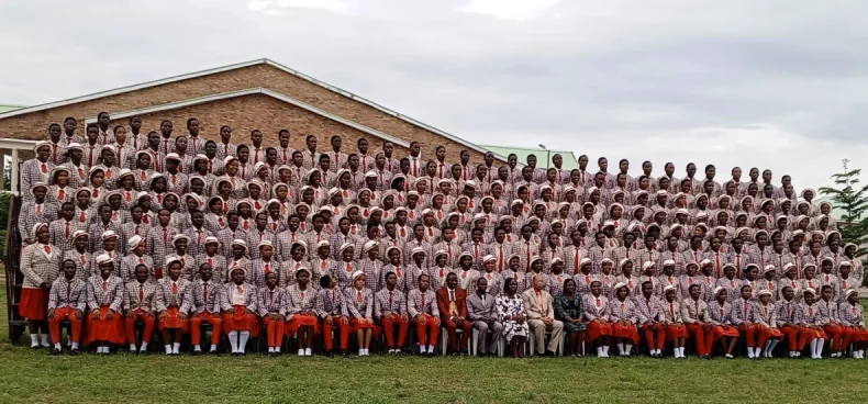 School group photography of hundreds of students and teachers in uniform arranged for a class portrait Lagos Nigeria